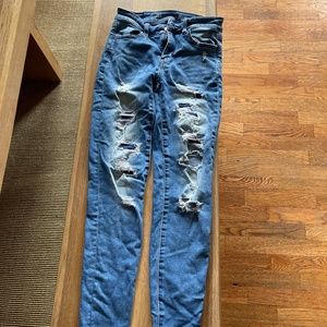 Ripped American eagle blue jeans